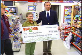 Anna Pearl Rowell receives her $110,000 winning Wild Card check Friday morning from the Idaho Lottery.