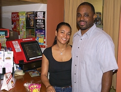 Marlene Webster, who kissed the winning lottery ticket, and Robert Lyseight, who runs the restaurant.