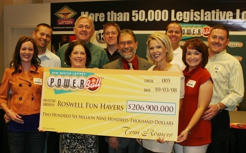 Nine friends from Roswell came to the New Mexico Lottery today to collect a Powerball jackpot of $206.9 million -- the New Mexico Lottery's largest prize ever.