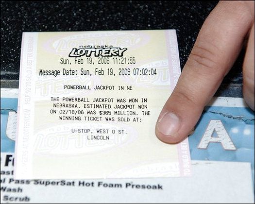 Kelly Bowen, operations manager at the U-Stop at First and West O streets in Lincoln, Neb., points to the confirmation message from the Nebraska Lottery Sunday, Feb. 19, 2006, that the winning Powerball ticket was indeed sold at their store.