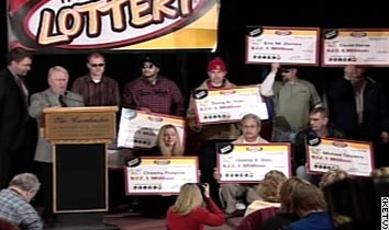 Eight workers at a Nebraska meat processing plant have claimed the record $365 million Powerball jackpot. The seven men and one woman were introduced by Gov. Dave Heineman in Lincoln, Nebraska. They held the only ticket matching the winning numbers sold at a U-Stop convenience store in Lincoln, lottery officials said.
