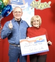 Douglas and Elizabeth Ross pose at the Atlantic Lotto offices in Moncton, N.B., Thursday.