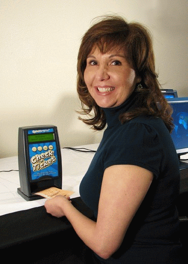 Marketing and Communications Director Adriana Binns demonstrates the new equipment.