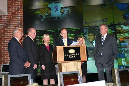 In a ceremony Thursday at Delaware Park racetrack and casino Gov. Jack Markell signed into law a bill that authorizes sports betting and table games in the state of Delaware. Joining him, visible from left, are Senate Majority Leader Anthony J, DeLuca, House Majority Leader Peter C. Schwartzkopf, Rep. Deborah Hudson, House Majority Whip Valerie Longhurst and Speaker of the House Robert Gilligan.