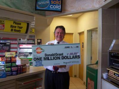 Donald Grant claimed a $1 million prize after playing the Georgia Lottery's World Class Millions instant game.
