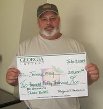 Jimmy May, 47, and an auto mechanic in Dublin, won $250,000 by playing the Millionaire Jumbo Bucks instant game.