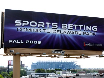 A billboard advertises sports betting in Delaware to drivers traveling southbound on I-95 in South Philadelphia.