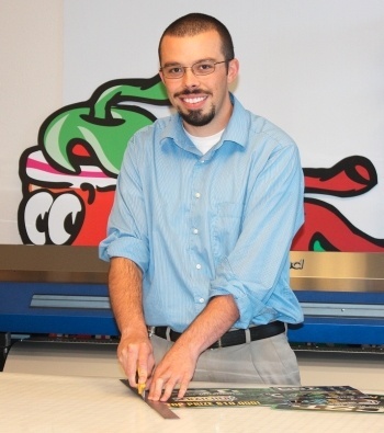 Joby Elliott, the 22-year-old graphic design student who created the Red vs. Green scratch-off lottery ticket for the New Mexico Lottery.